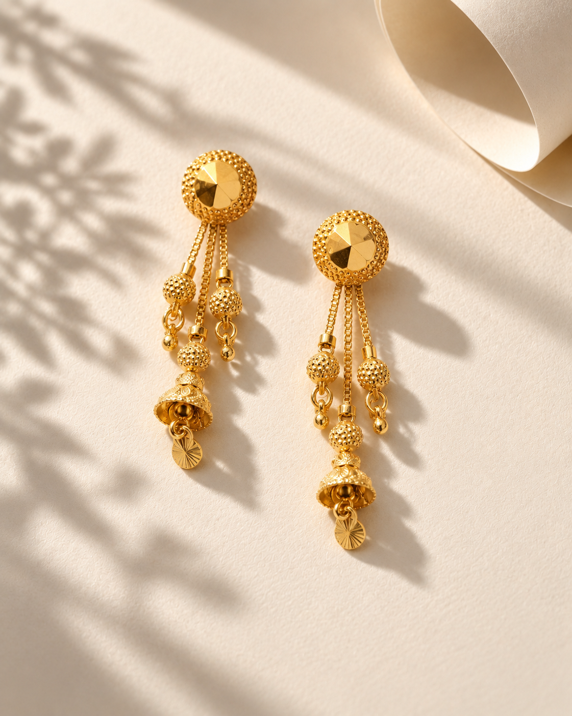 Golden Jhumka Drop Earrings with Multi-Chain Bead